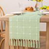 imageSocomi Farmhouse Macrame Plaid Coffee Table Runner  72x13 inches Cotton Rustic Fall Thanksgiving Table Runner with Tassels for Boho Home Decor in Emerald GreenSage Green