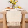 imageSocomi Farmhouse Macrame Plaid Coffee Table Runner  72x13 inches Cotton Rustic Fall Thanksgiving Table Runner with Tassels for Boho Home Decor in Emerald GreenBeige